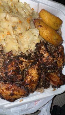 Six piece jerk, chicken wings with rice and cabbage