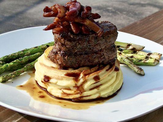 Aged Filet Mignon with Gouda duchess potatoes and grilled asparagus.