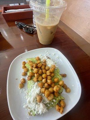 Avocado toast with chickpeas and feta cheese and a chagaccino (mushroom coffee)