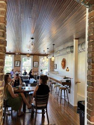 Upstairs area with tables