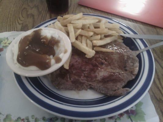 10 ounce ribeye french fries and mashed potatoes with brown gravy