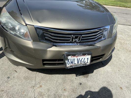 Front grille and hood busted from accident