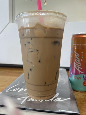 Custom: 4 shots of espresso and white chocolate over ice with a bit of cream.