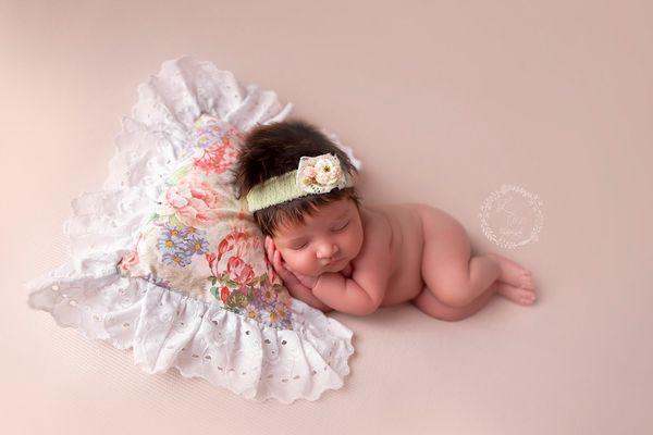 Newborn session included with the Baby Steps Program.