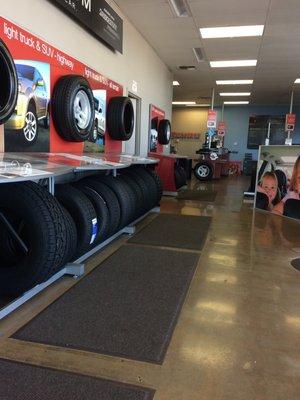 waiting area and display of good selection of tires