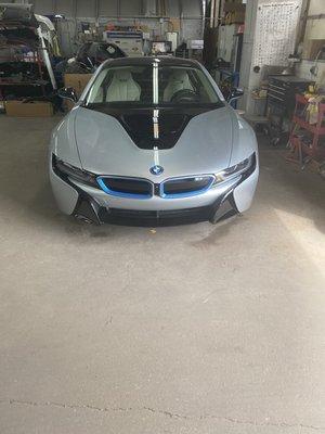 Before and after of a BMW i8 supercar.