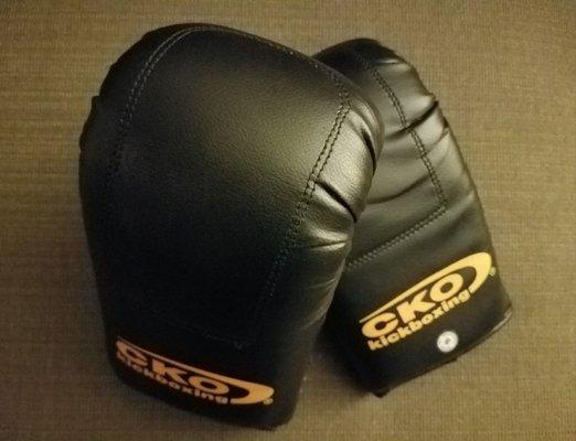 Boxing gloves available for sale at the gym.