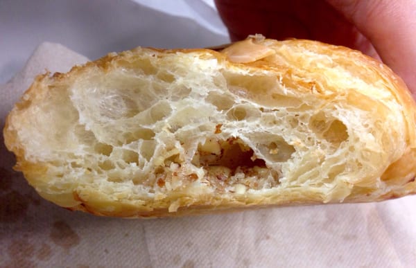 Almond croissant: Close-up on the sweet almond filling. _ 04 '16.