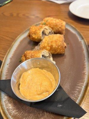 Steak and cheese egg rolls