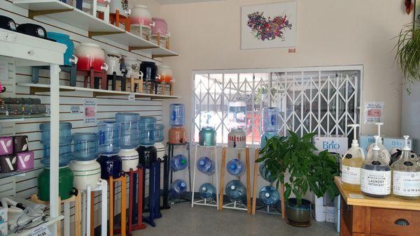 Collection of wood, metal, and combination Stands, Porcelain crocks, as well as Electronic Water dispensers for hot/cold/room temp choices.