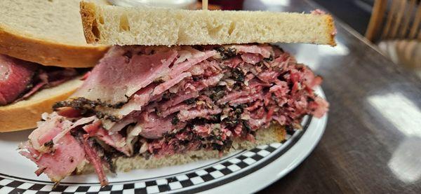 Whole pastrami sandwich on unseeded rye