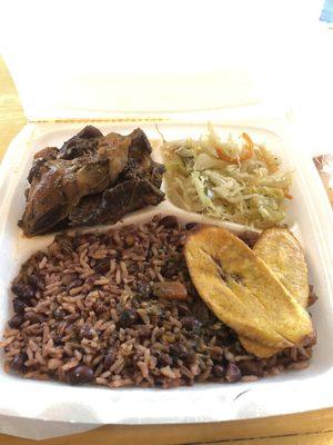 Brown stew chicken, cabbage, rice and peas, plantain