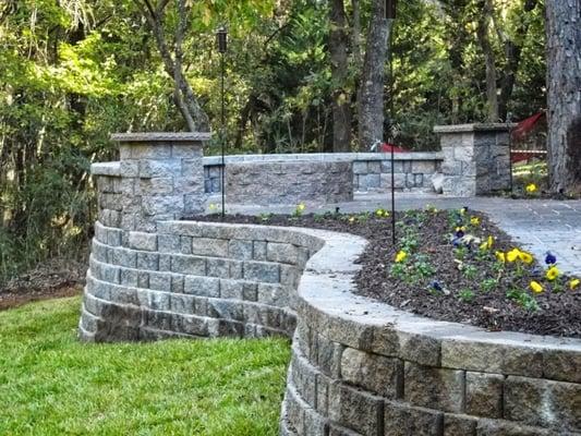 This backyard had a 10 ft drop from the back of the home to the bottom of the hill.  We built up the area and created a full ...