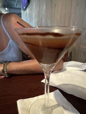 Chocolate martini, not made well the chocolate liquor all at the bottom and the alcohol floating on top.