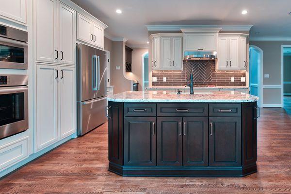 Magnificent lighting and cavernous storage make this kitchen remodel we completed with Hilliard Contracting stand out.