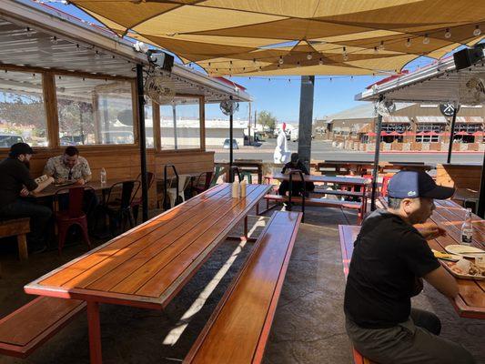 Ample outdoor seating with shade.