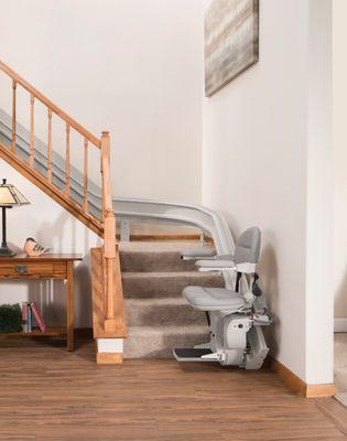 curved stair lift at bottom landing of home in Maryland