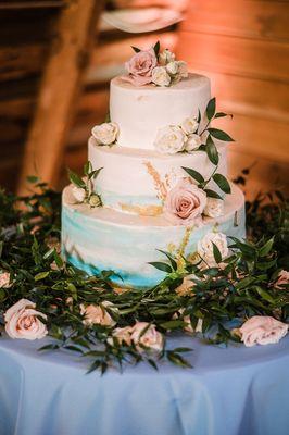 Wedding cake (vanilla cake with fruit and fresh cream between layers covered with fresh cream)