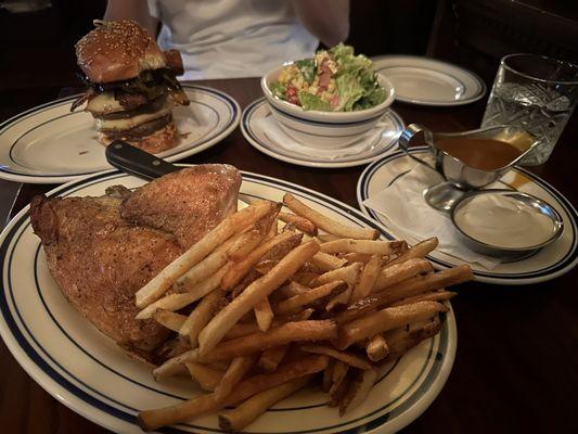 Top left to right: Royal burger & half roasted chicken entree with salad, fries, gravy + aioli