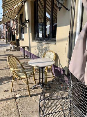 Outdoor tables and seating in the morning