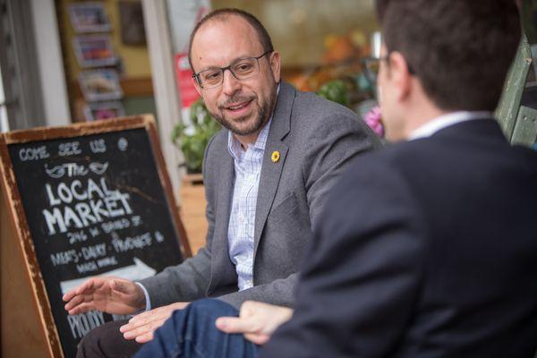 meeting in front of The Local Market