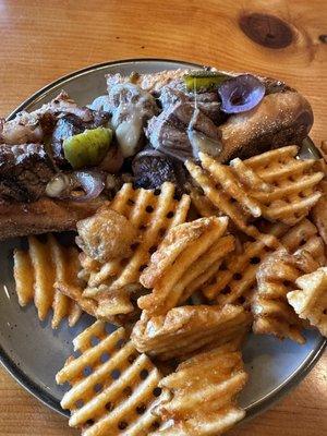 Cheesesteak sub with mushrooms, pepper & extra cheese.  Waffle Fries!!!