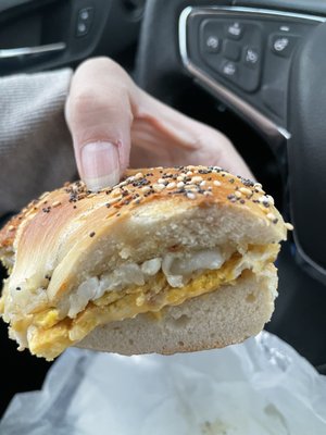 My delicious egg cheese hash brown on a soft yummy everything bagel