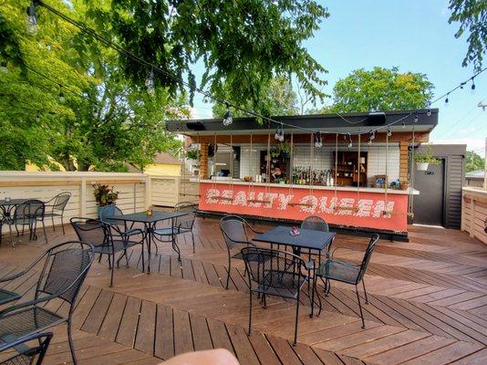 The second-floor deck and bar  above Beauty Queen.