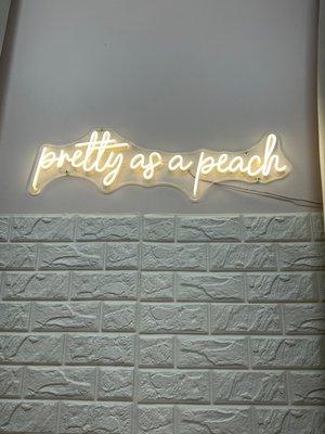 Pretty as a Peach - View on wall in room when get services with their incredible Aesthetician