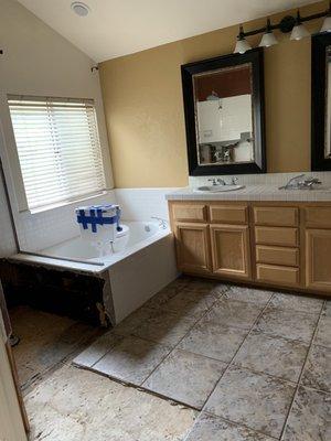 Vanity Tile they made homeowner try to find and match so they could save money on countertop tile replacement