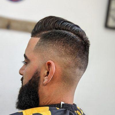 Mid fade comb over