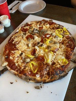 A delicious BRICK OVEN pizza topped how we wanted.