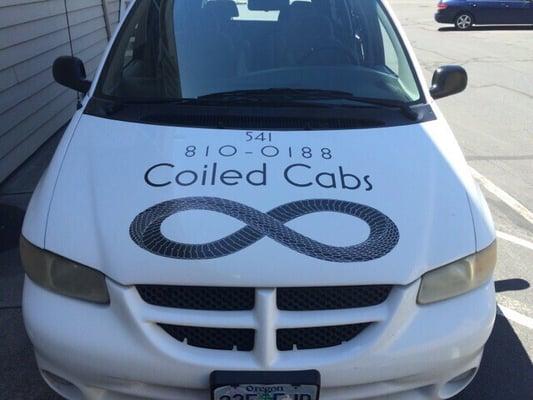 My taxi the other day at Coiled Cabs. Her name is  "Harliquinn."!