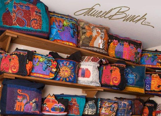 Laurel Burch designs in a variety of themes, colors and sizes. Totes, bags, mugs. Too many to show here!