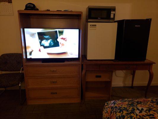 Very outdated ugly room furniture... two mini fridges!!!