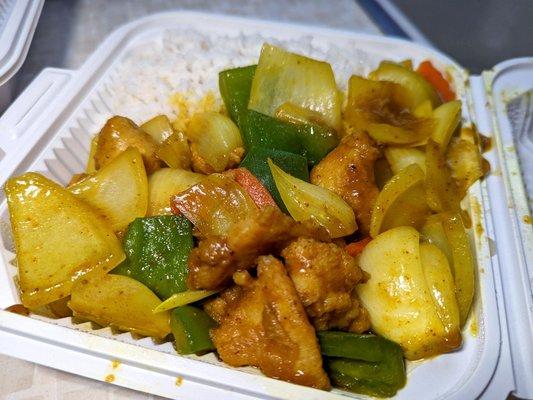 curry chicken over rice $8.50