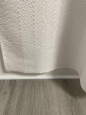 Hemmed shower curtain