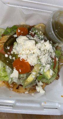 Sopes de pastor ( deep friend hand made tortilla with beans beat lettuce and everything on top sooo good!!