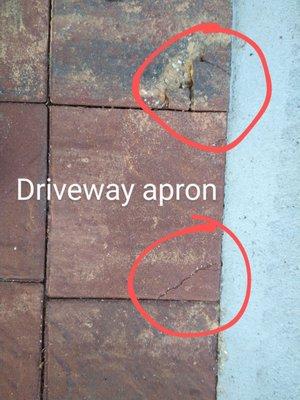 More cracked pavers in the driveway.