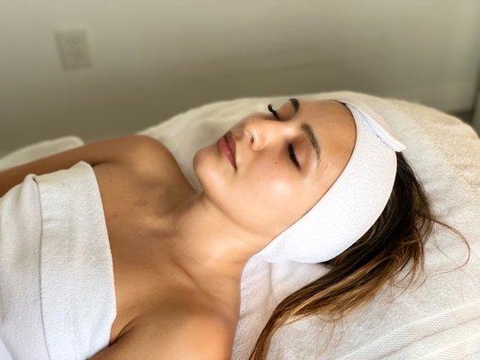 Glowing skin after the ultimate cave facial with esthetician Sara