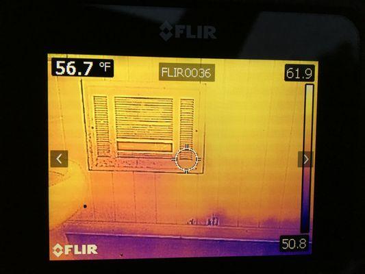 Thermal imaging shows issues at the wall at this basement bathroom not visible to the naked eye.