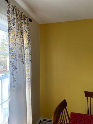 Dining room- Color change from bold red to gold and a neutral white.