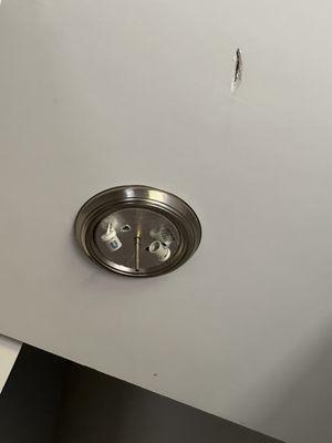 Fixture removed and hole in ceiling