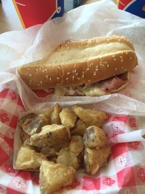 This DQ offers the "Jim Dandy" ham-and-cheese hoagie; They also make these potato wedges by hand; both were great.