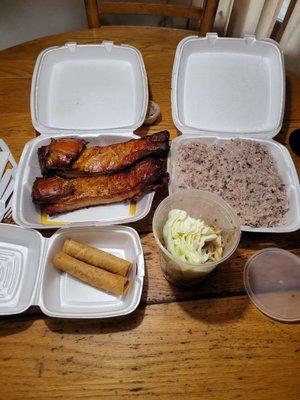 Smoked pork Billy's, purple sticky rice, papaya salad, and two eggrolls.