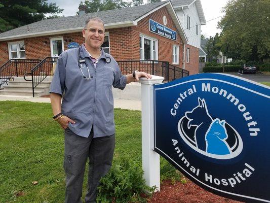 Dr. Bloom with our new sign.