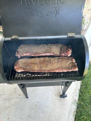 Too baby back. Bottom Saint Louis style ribs.  I made a rub.