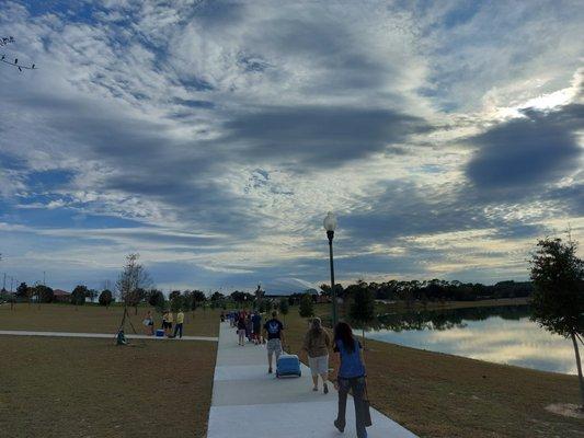 the walkway to the Amphitheater is 10-15 minutes away depending on your stride. Be sure to bring everything on the first trip if you can.