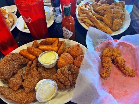 Cajun Big Un' with a saddle of Frog Legs and and unsweetened tea with lemon.