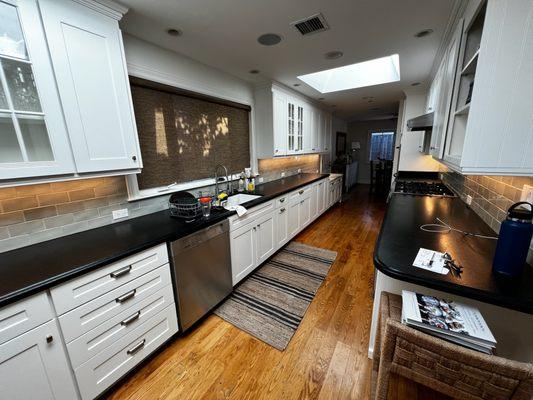 Under kitchen cabinet lighting.